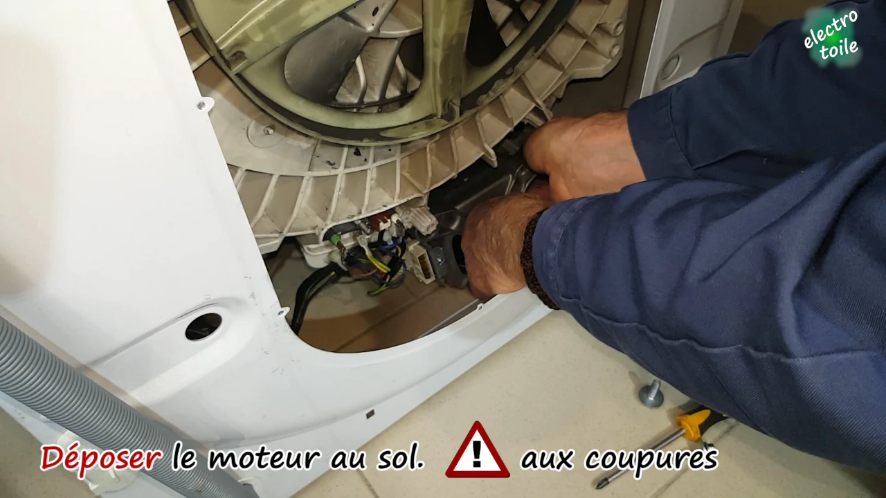 deposer le moteur de la machine à laver au sol